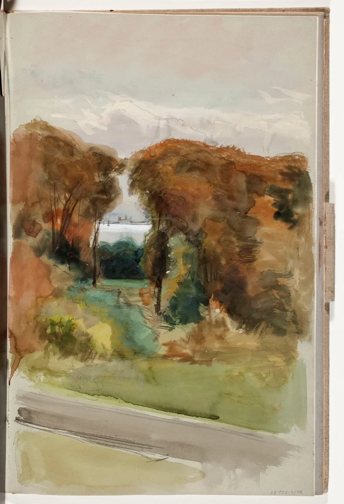 Open sketchbook with a watercolour landscape study